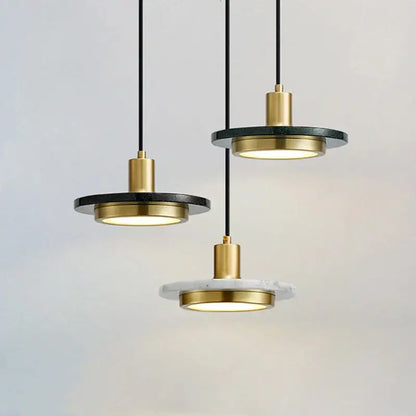 Modern DecorBites LED marble pendant light with gold-toned metal fixtures and black and white circular discs for luxury decor