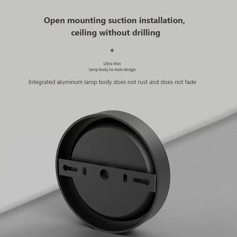 Black decorbites™ minimalist ceiling light with integrated aluminum body and suction cup mounting for modern homes