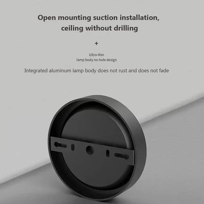 Black decorbites™ minimalist ceiling light with integrated aluminum body and suction cup mounting for modern homes
