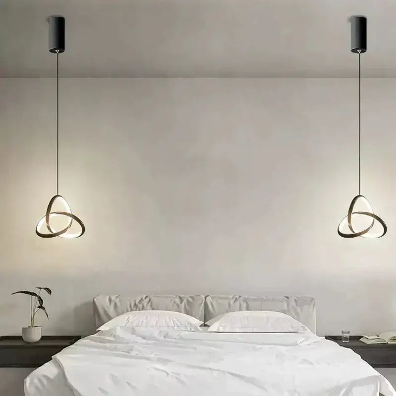 Modern black pendant light with sleek interlocking rings from decorbites led minimalist pendant collection for bedroom