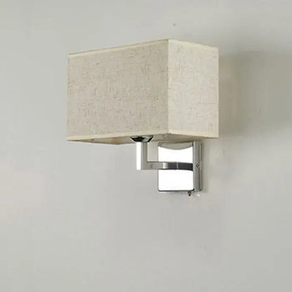 Modern rectangular wall lamp with textured beige fabric shade and polished chrome base by decorbites led minimalist wall lamps