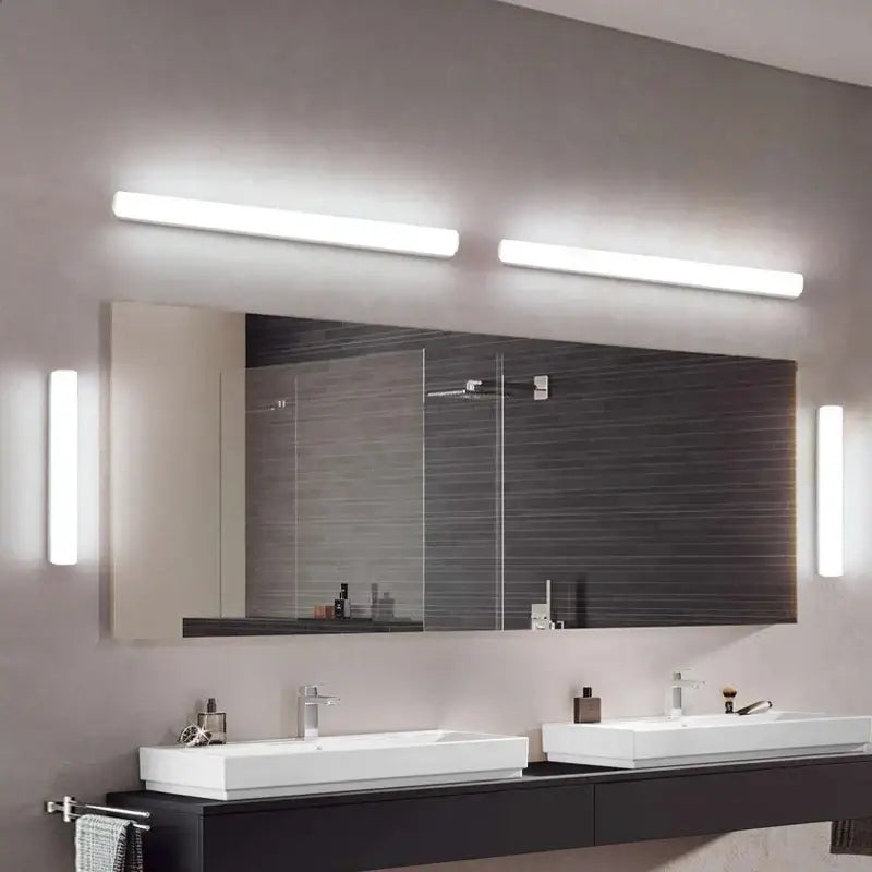 Modern rectangular led mirror with sleek white frame and integrated light designed for decorbites led mirror wall sconces