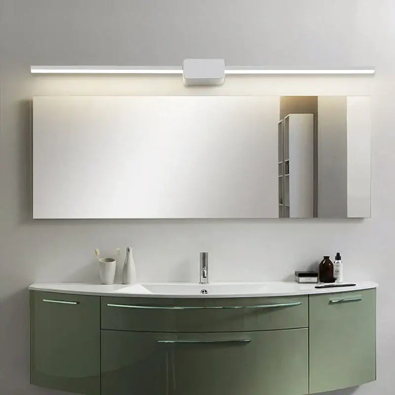 Modern minimalist bathroom vanity with sage green glossy finish and decorbites led mirror wall sconces above rectangular mirror