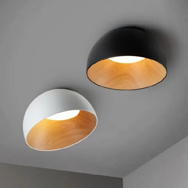 Two decorbites led modern semi-flush ceiling lamps in black and white with warm wood-toned interiors for indoor use