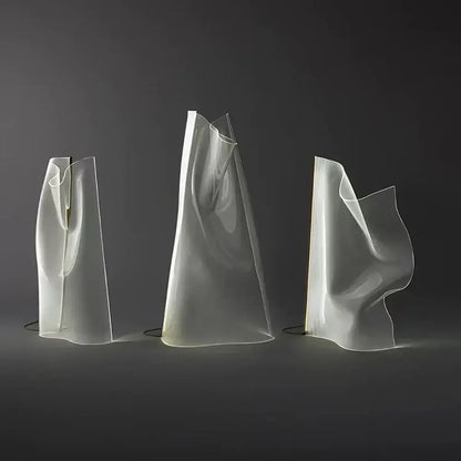 Three translucent decorbites led modern floor lamps with flowing forms and soft white glow for living room decoration