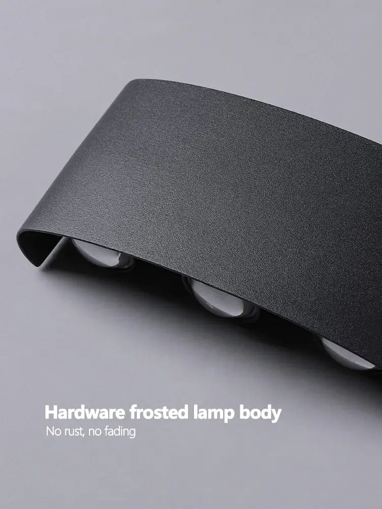 DecorBites™ LED modern minimalist wall lamp with black frosted hardware and three embedded lights for bedroom use