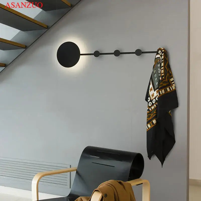 Black minimalist wall lamp decorbites led moon with circular lamp head and four round knobs for home decoration and ambiance