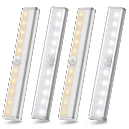 Set of four sleek silver DecorBites led motion sensor night lights with warm and cool white illumination for cabinets