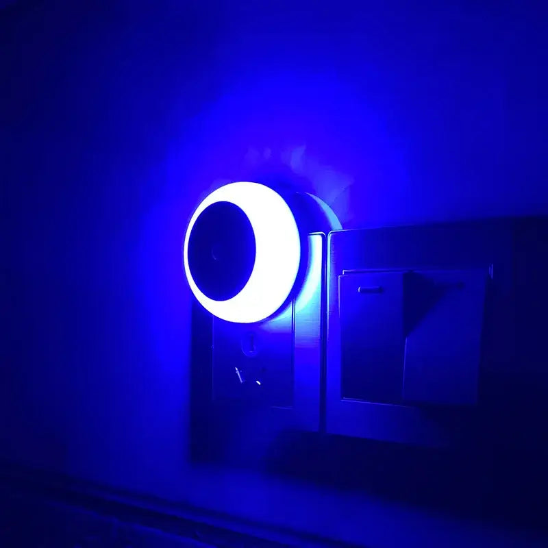 Decorbites led night smart sensor crescent moon shaped blue night light plugged into wall outlet for home use