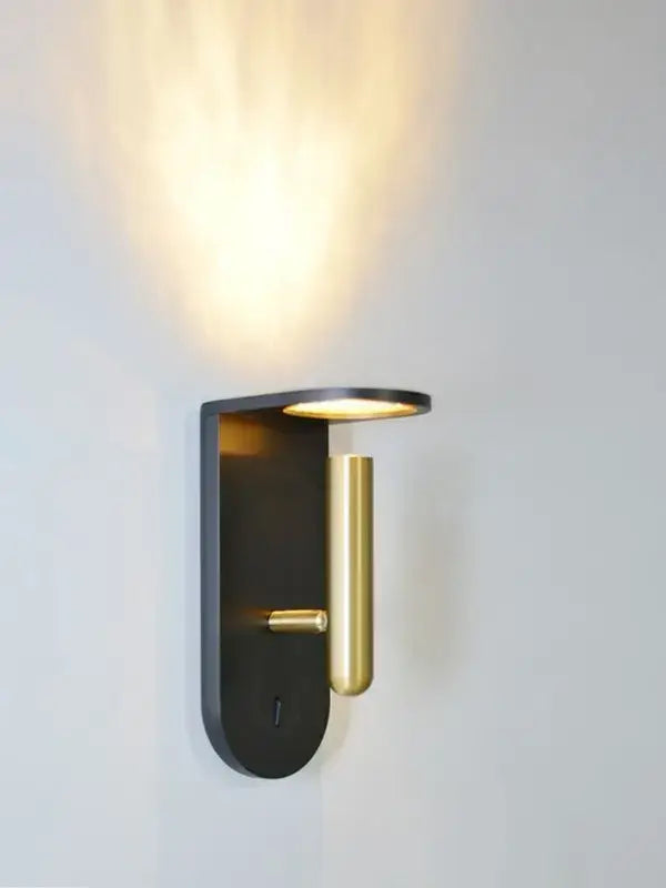 Modern wall lamp decorbites led nordic with sleek black backplate and polished brass accents emitting warm ambient light