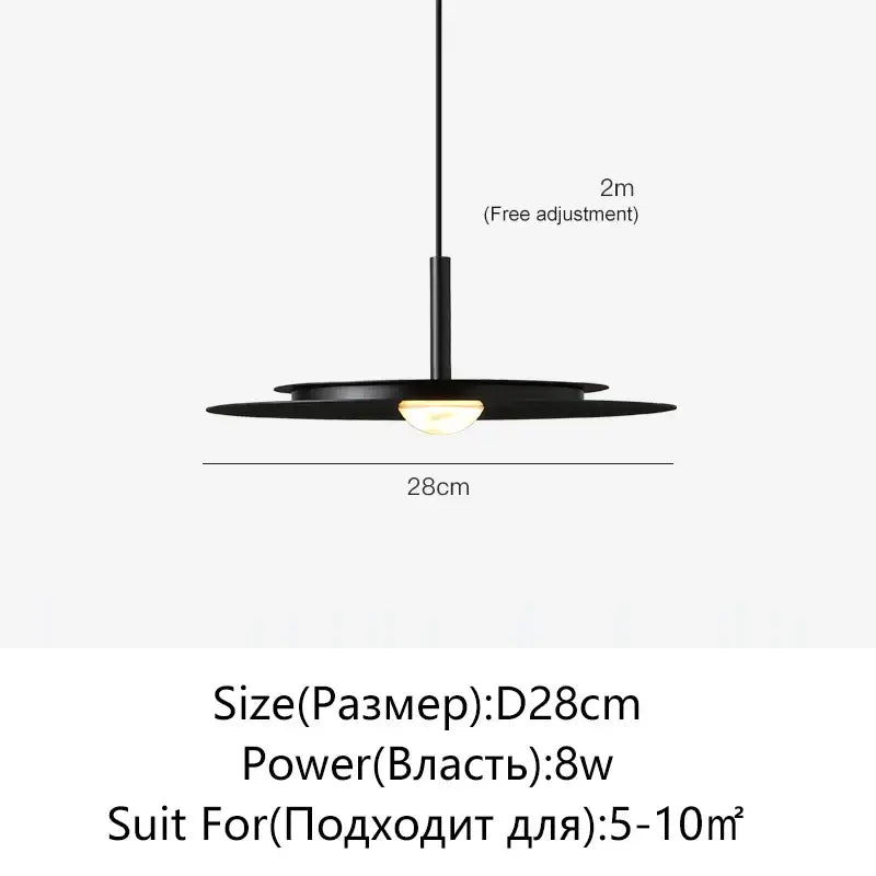 Black minimalist flying saucer chandelier with sleek disc design and warm led bulb for modern decor by DecorBites