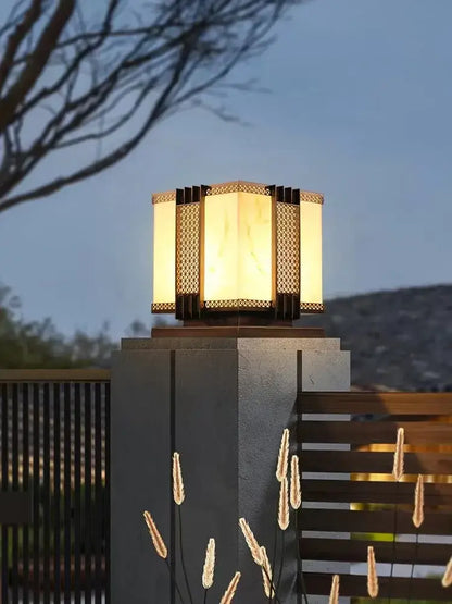 Warm-toned decorbites led outdoor street lamp with hexagonal marble design and intricate lattice for pillar fence lighting