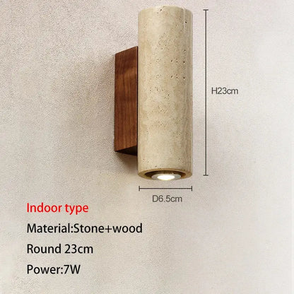 A modern cylindrical stone and wood wall lamp with warm beige finish decorbites led outdoor for garden lighting