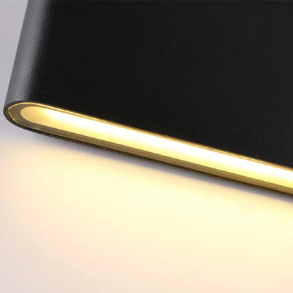 Black decorbites led outdoor wall lamp with integrated warm yellow led strip and sleek modern design for indoor corridor lighting