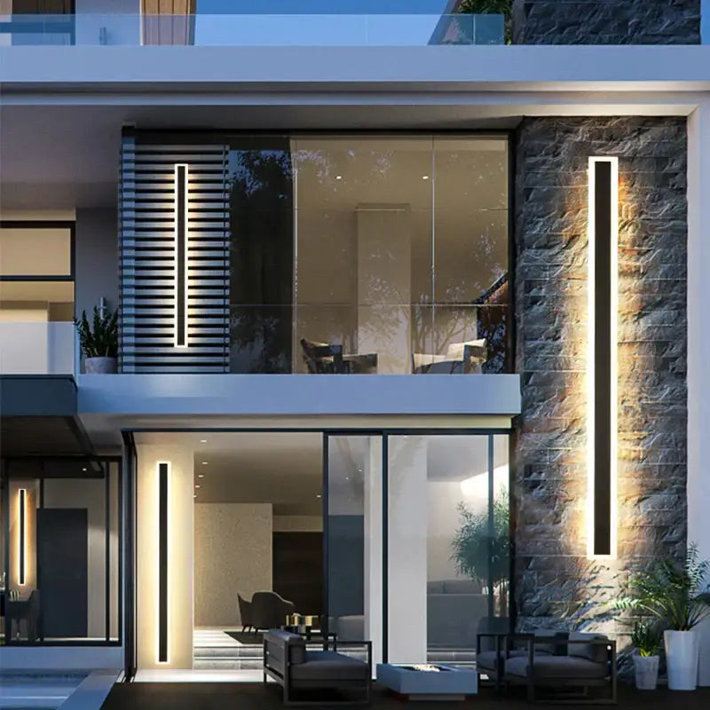 Decorbites led outdoor wall light with sleek black frames and warm white illumination on stone and glass exterior walls