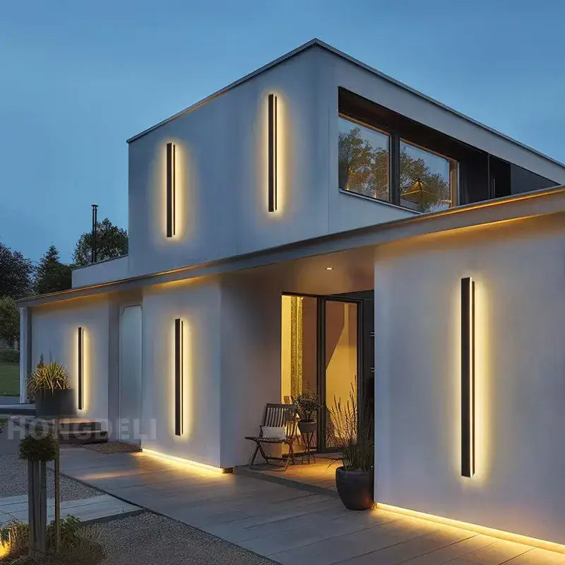 Modern minimalist decorbites led outdoor wall light with vertical black aluminum frame and warm amber led outdoor wall glow