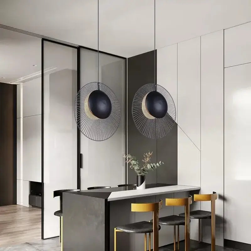 Black circular DecorBites oyster pendant lamp with gold wireframe accents for adjustable loft bedroom lighting