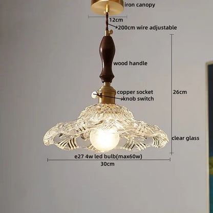 Decorbites led pendant lamp with a clear glass carved petal design and dark wood handle pendant light fixture