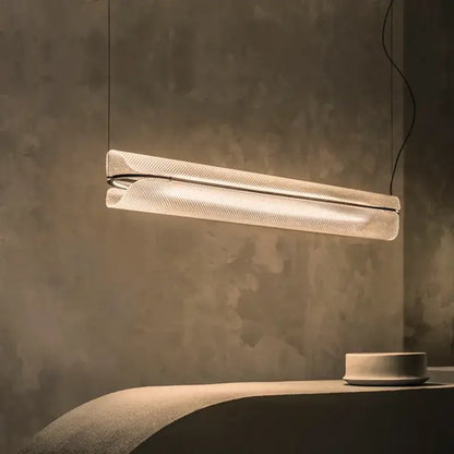 Modern minimalist decorbites led pendant with textured translucent glass and sleek metallic accents for home and office lighting