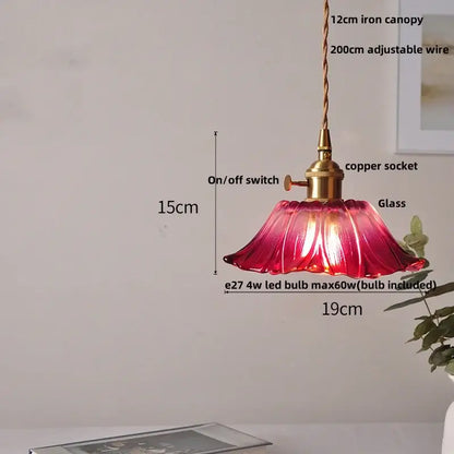A vibrant red glass pendant lamp with fluted petal design and brass hardware in decorbites led pendant lamp style