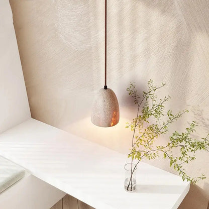Minimalist decorbites led pendant lamp with yellow travertine concrete and warm glowing interior light