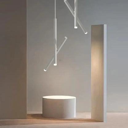 Minimalist white cylindrical DecorBites LED pendant light with sleek modern design for living room ceiling lighting