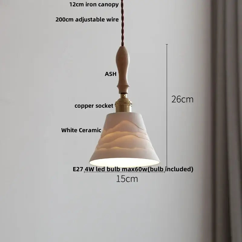Decorbites led pendant light featuring a white ceramic shade with wave pattern, iron canopy, and copper socket