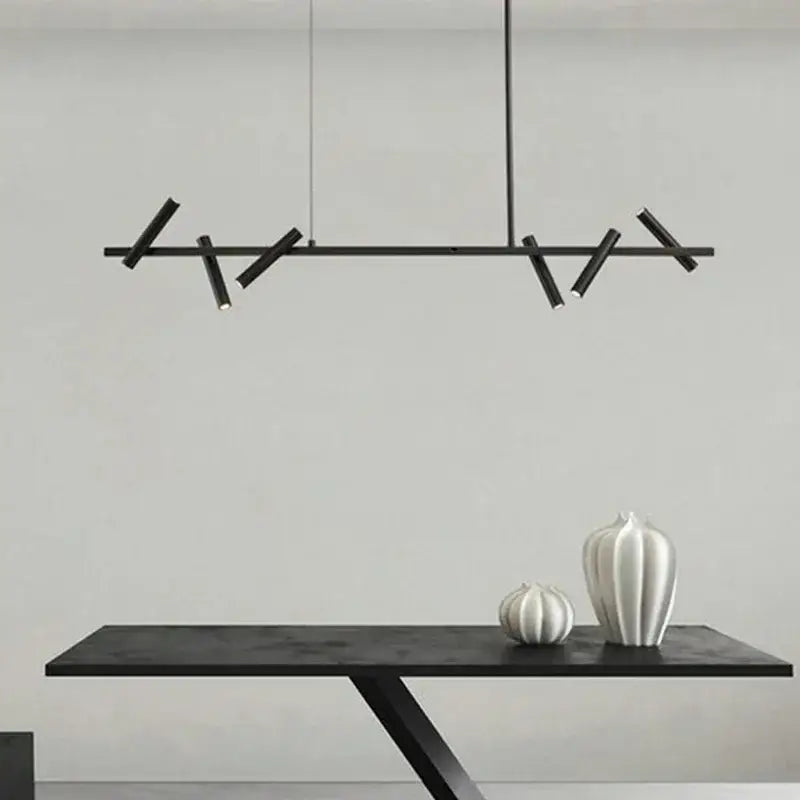 Black minimalist DecorBites led pendant light with angular branch-like arms and sleek cylindrical fixtures for modern decor