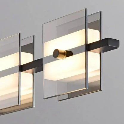 Modern wall sconce with clear glass panels and brass accents featured in decorbites led pendant light for indoor lighting