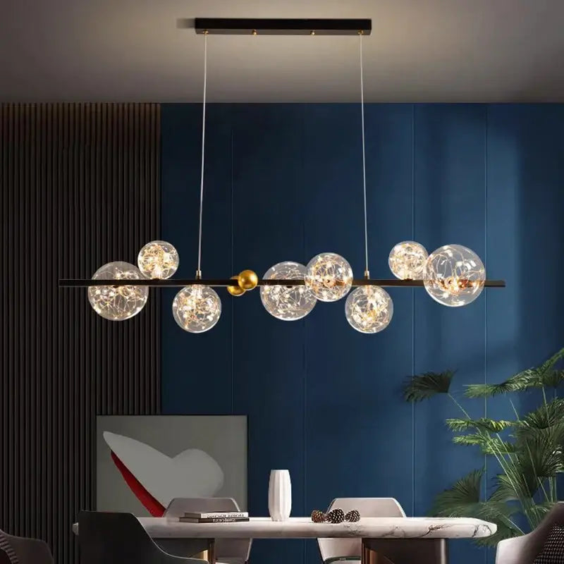 Modern decorbites led pendant light chandelier with clear glass globe bulbs and black metal frame for indoor use