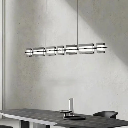 Modern minimalist decorbites led pendant light with six translucent acrylic panels on a black metal frame for indoor use