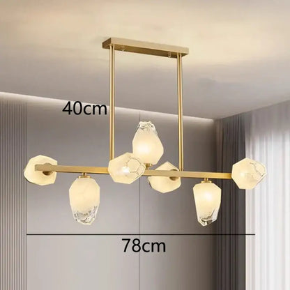 Gold-toned DecorBites LED pendant light chandelier with faceted crystal glass shades for modern living room lighting