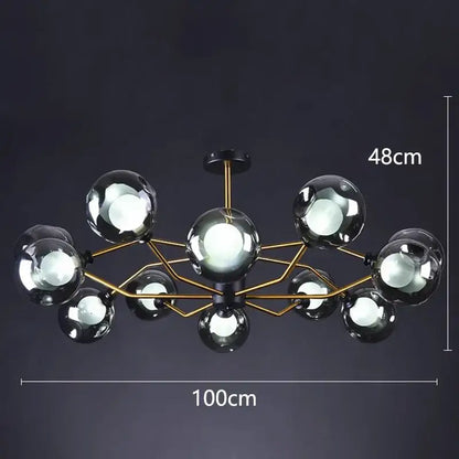 Modern chandelier with gold-toned metal frame and dark glass spheres for decorbites led pendant light dining rooms