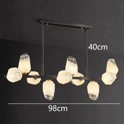 Modern black metal decorbites led pendant light chandelier with faceted crystal glass shades emitting warm glow
