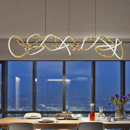 Gold-toned decorbites led pendant with intricate flowing design for modern living and dining room lighting