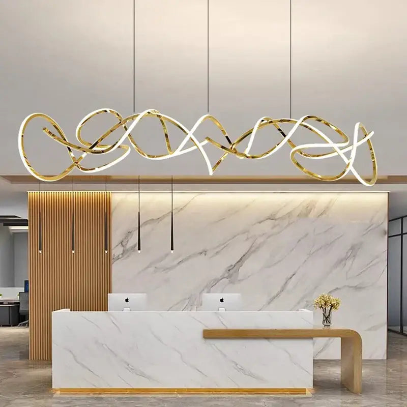 Gold-toned DecorBites LED pendant light chandelier with intertwined metallic loops and integrated LED lighting for modern spaces