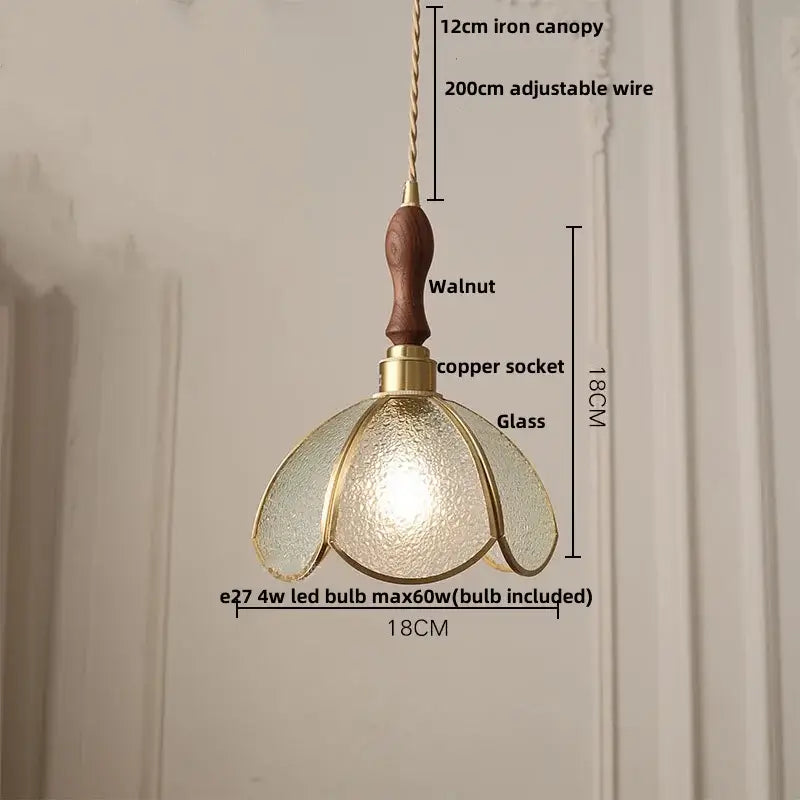 Decorbites led pendant light featuring a textured glass shade, brass accents, walnut handle, and adjustable copper socket