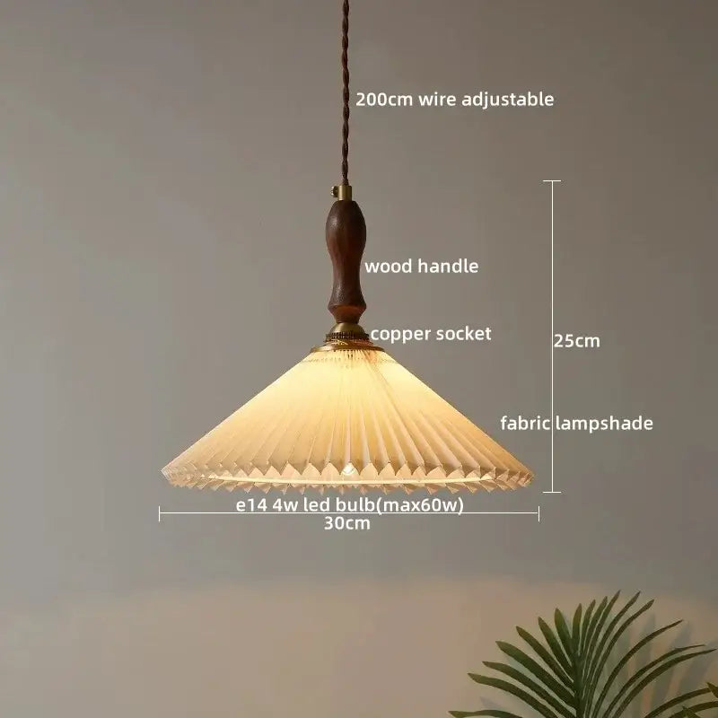 Decorbites led pendant light featuring a warm-toned pleated fabric shade with wood handle and copper socket