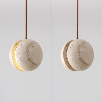 Minimalist decorbites led pendant light with textured off-white concrete body and warm gold inner ring yellow travertine finish