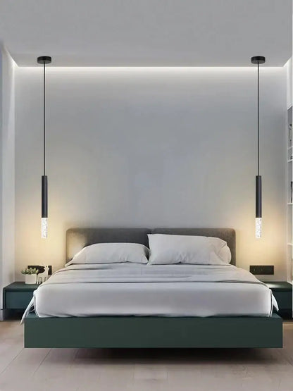 Modern black decorbites led pendant light with cylindrical glass shades hanging above bed for living room use