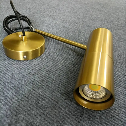 Brass-finished adjustable wall-mounted led spotlight with cylindrical head for bedroom by decorbites led pendant light
