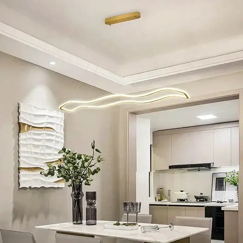 DecorBites led pendant light with modern aluminum wave design and warm golden illumination for stylish decor