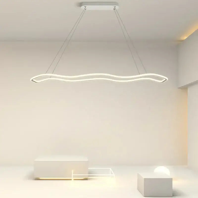 Modern white aluminum decorbites led pendant light with sleek wavy design and thin metal suspension cords