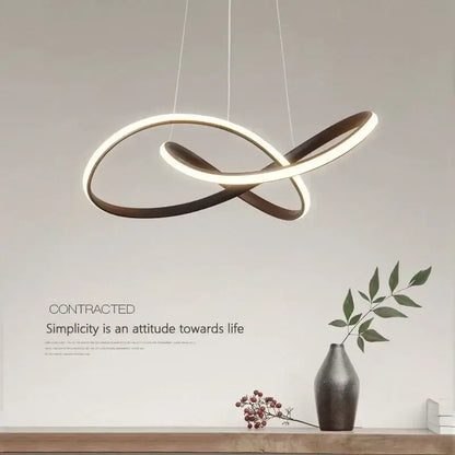 Modern infinity-loop decorbites led pendant light with two interlocking polished metal rings in white led and matte brown