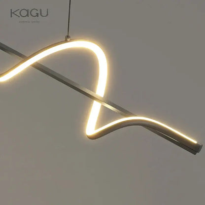 Modern minimalist DecorBites LED pendant light in white and black with sleek curved design and warm white illumination