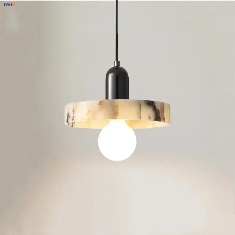 Decorbites led pendant featuring a creamy beige marble patterned shade and black metal fixture pendant lights bulgari stone