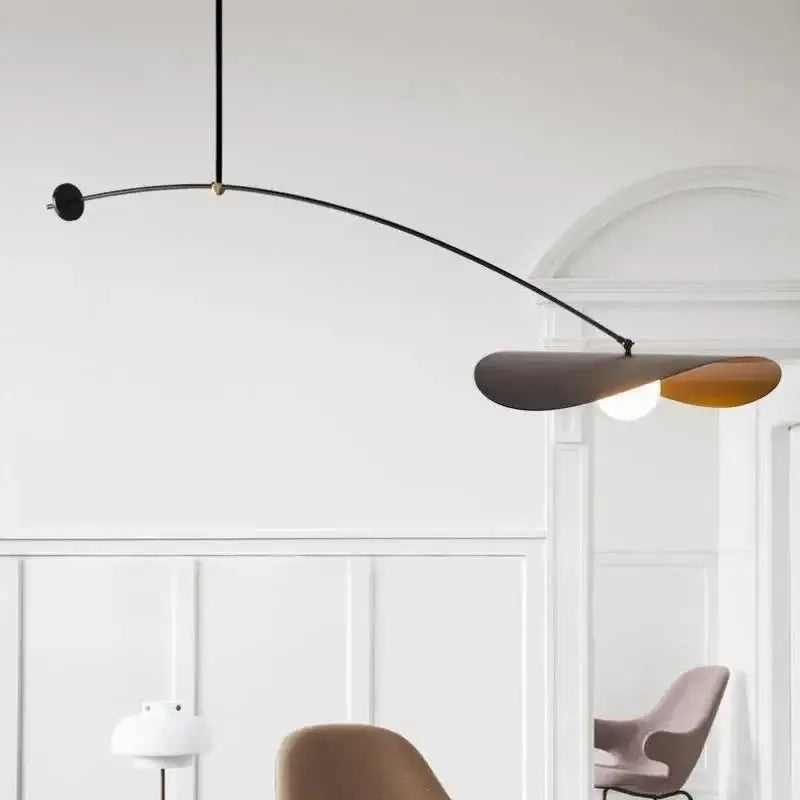 Modern black and gold DecorBites LED pendant lights with sleek curved arm and dual-toned leaf-shaped shade for home decor