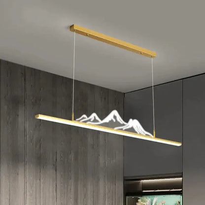 Gold-finished decorbites led pendant linear lights with glowing white mountain silhouette for modern home decor
