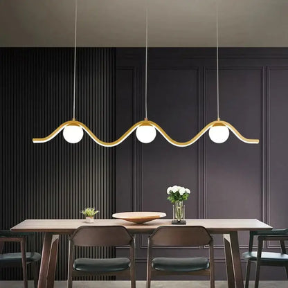 Gold-toned wave-shaped decorbites led pendant light with three white spherical bulbs for modern indoor lighting