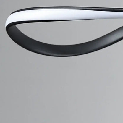 A sleek black and white decorbites led pendant lamp with curved design for modern living dining room lighting